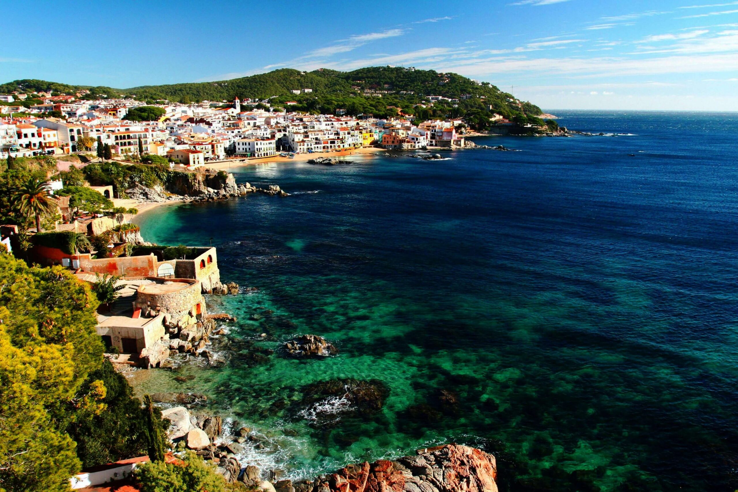 View of the Costa Brava with information about property prices in Girona province.